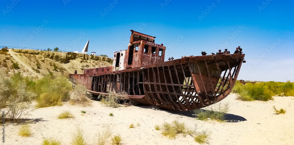 Boats cemetery around the Aral Sea. Rusty carcasses in the desert dunes where once there was water.