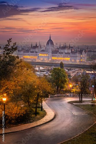 Photography Budapest, Hungary - Curved road at Buda district with Parliament and colurful su