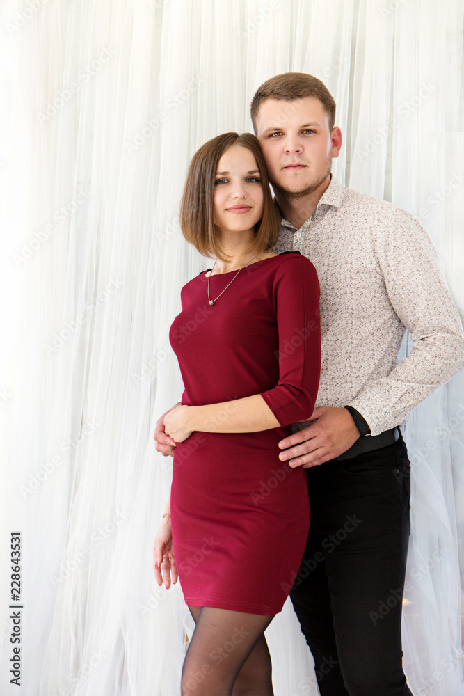 Fototapeta premium Romantic couple in white curtains