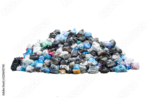 Big pile of garbage in black blue trash bags isolated on white background. Ecology concept. Pollution environment disaster photo