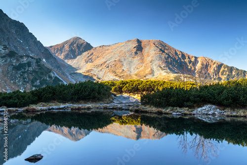 Mountain landscape with tarn at autumn, The area of Rohace in Tatras National Park, Slovakia, Europe.