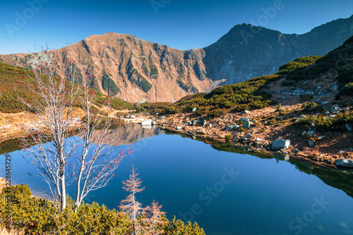 Mountain landscape with tarn at autumn, The area of Rohace in Tatras National Park, Slovakia, Europe. © Viliam