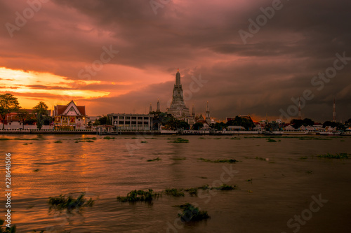 Wat Arun Ratchawararam Ratchawaramahawihan The Chao Phraya River, symbolizing the beauty of the world is one of the important landmarks. Beautifully decorated with art and architecture. © bangprik