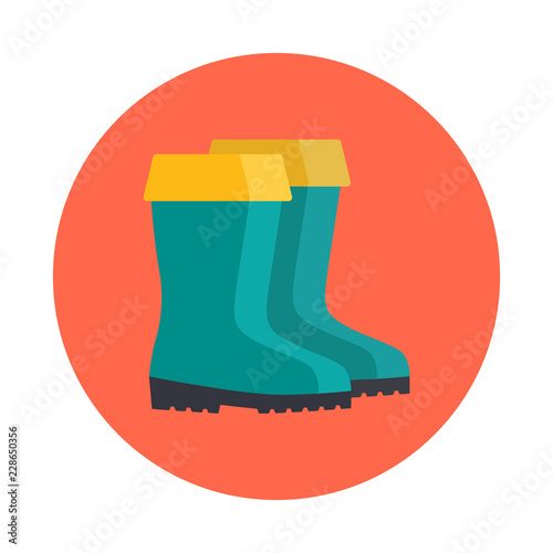 Rubber boots flat icon isolated on orange background. Simple 
Rubber boots symbol in flat style. Fishing symbol Vector illustration for web and mobile design.