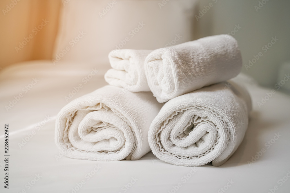 white towels on bed for hotel customer white towels on bed for hotel customer