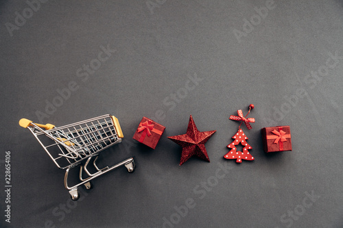 Conceptual photo of Christmas sales or gift shopping. Preparing for the New Year and Christmas. Buying gifts.