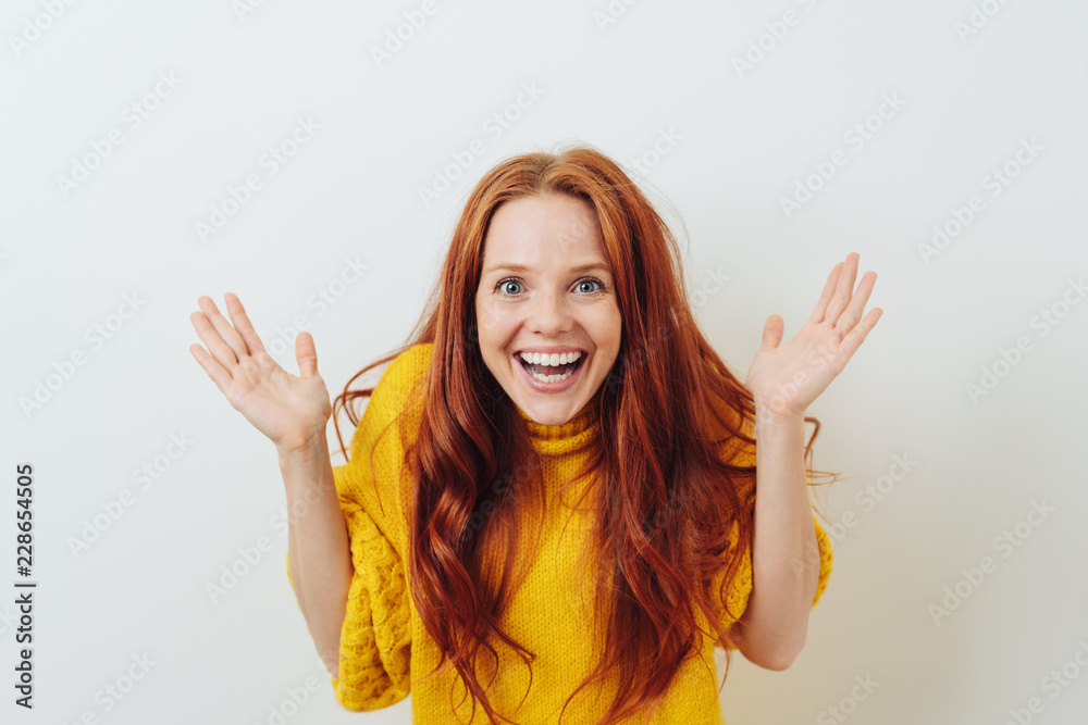 Vivacious young woman with a delighted expression Vivacious young woman with a delighted expression