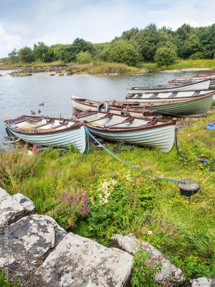 Rowing boats at Kilbeg Pier near the town of Headford in County Galway, Ireland. Rowing boats at Kilbeg Pier near the town of Headford in County Galway, Ireland.