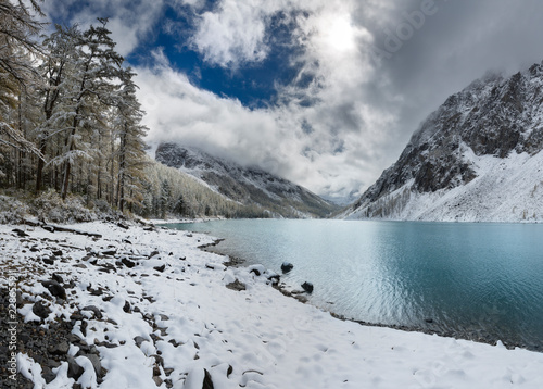 Snow winter mountain lake bright and early  Russia  Siberia  Altai mountains  Chuya ridge.