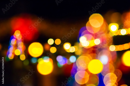 abstract composite of Christmas street lights at night © Pellinni
