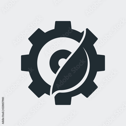 Icono plano engranaje y hoja en fondo gris