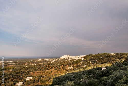 Panoramic view of the medieval white village of Ostuni at sunset © Sergio Pazzano