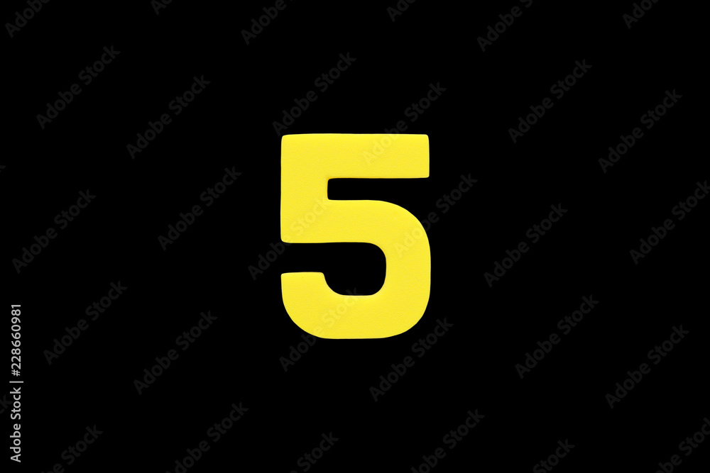 Arabic number 5 symbol of sponge rubber isolated on black background. Arabic number 5 symbol of sponge rubber isolated on black background.