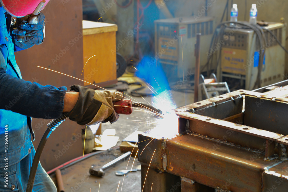 Welding welding workers strike out sparks Welding welding workers strike out sparks