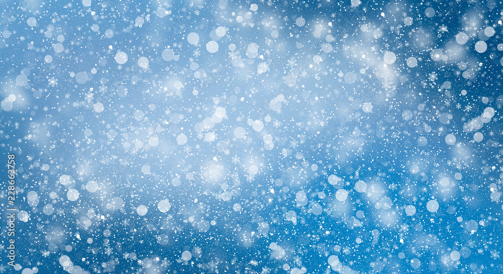 Blue bokeh background with snowflakes. Empty winter background, snowy, celebratory.