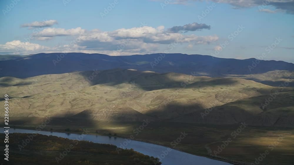 Time lapse shadow of clouds on mountains Time lapse shadow of clouds on mountains