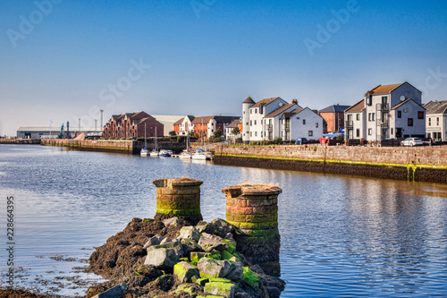 View from the New Bridge over the River Ayr towards the sea at Ayr, Scotland. photo