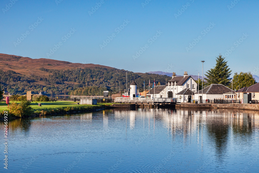 The Lock-Keepers house and the Lighthouse at Corpach, on the Caledonian Canal, Highland, Scotland, UK