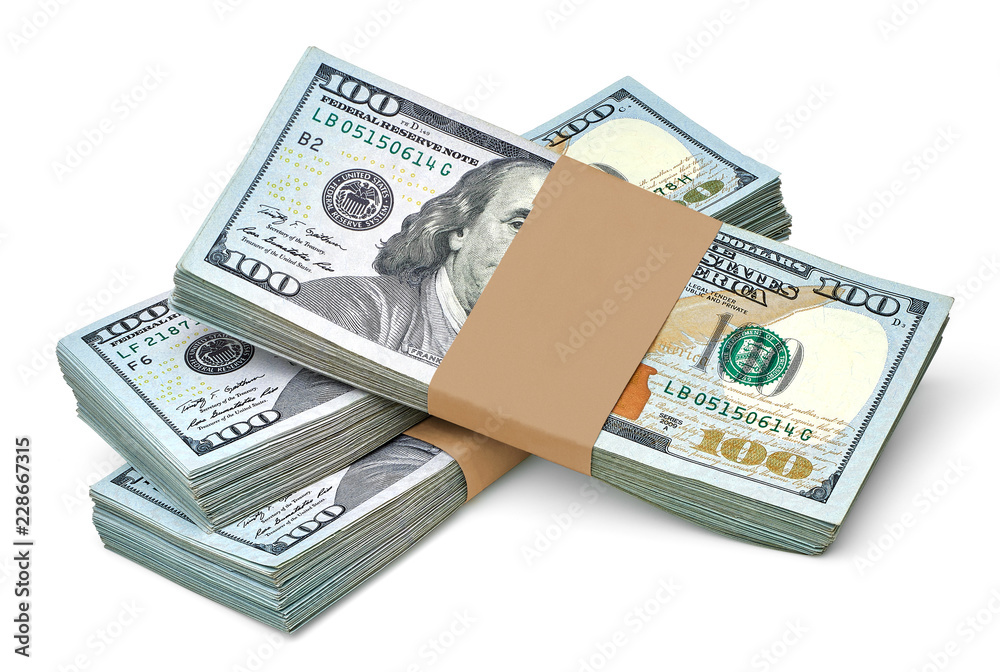 New US Dollar bills bundles stack on white background including clipping path. New US Dollar bills bundles stack on white background including clipping path.
