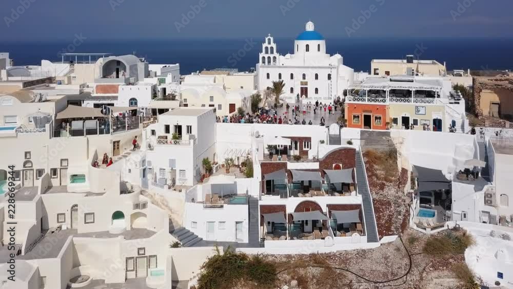 Flight over of Oia town on Santorini island, Greece Flight over of Oia town on Santorini island, Greece