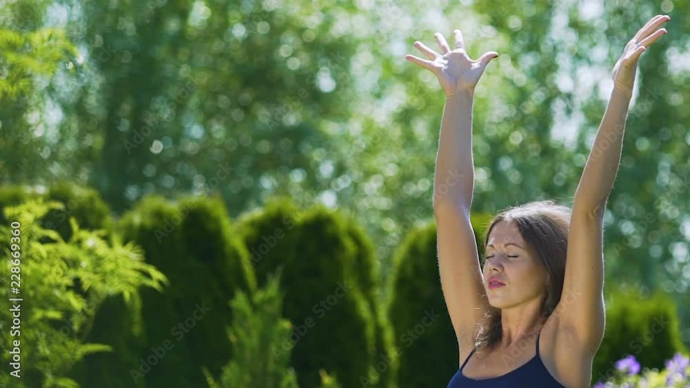 Woman senses nature power, extra sensory abilities, sun energy prana through