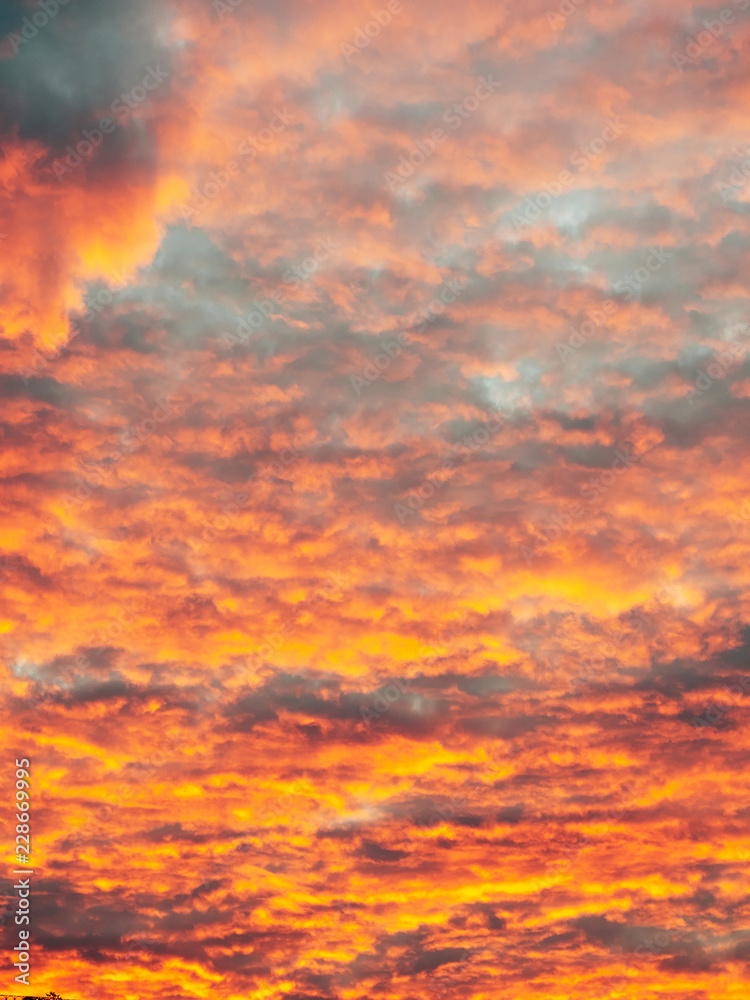 Beautiful cloudly sunset with bright saturated colors