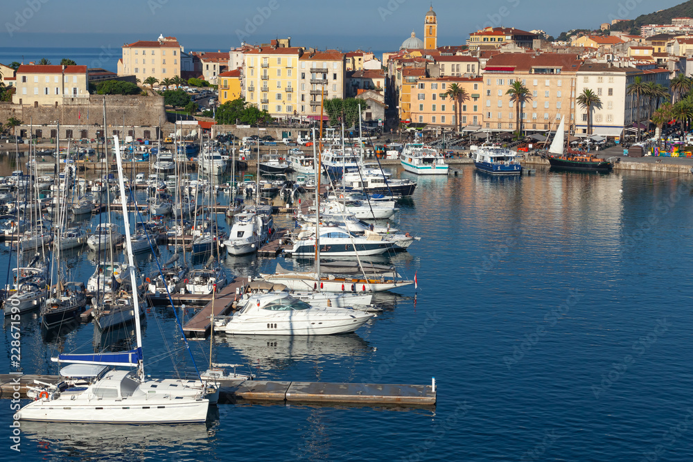 Ajaccio port. Coastal cityscape with yachts