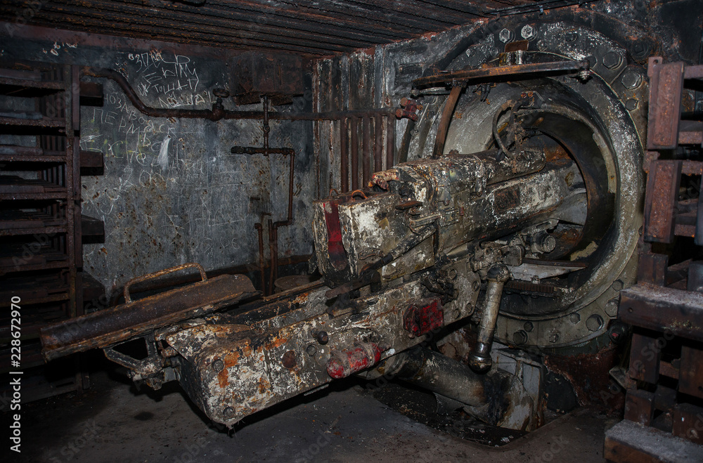 An abandoned bunker, an old military pillbox, an infantry weapon preserved after the war