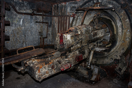 An abandoned bunker, an old military pillbox, an infantry weapon preserved after the war