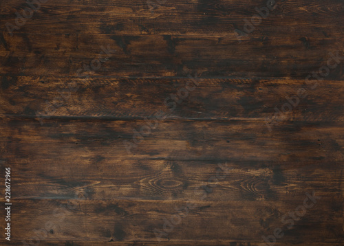 Old dark textured wooden background, brown wood stained style