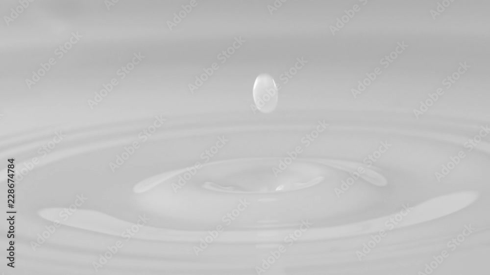 Milk drops of oil falling in pond and making ripple. Slow motion.
Milk drops of oil falling in pond and making ripple. Slow motion.