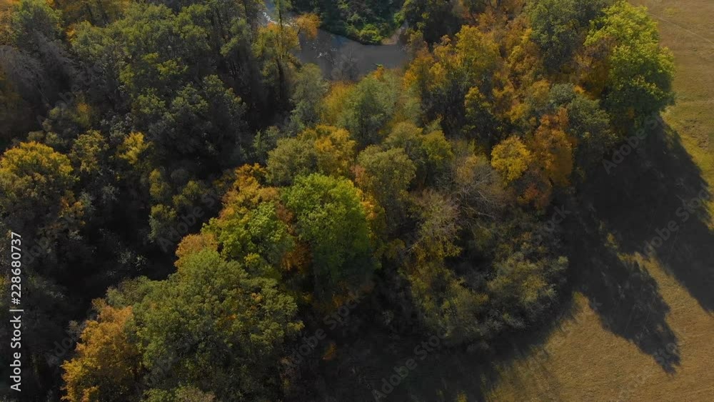 aerial view of a rural landscape with some trees and the meandering river aerial view of a rural landscape with some trees and the meandering river
