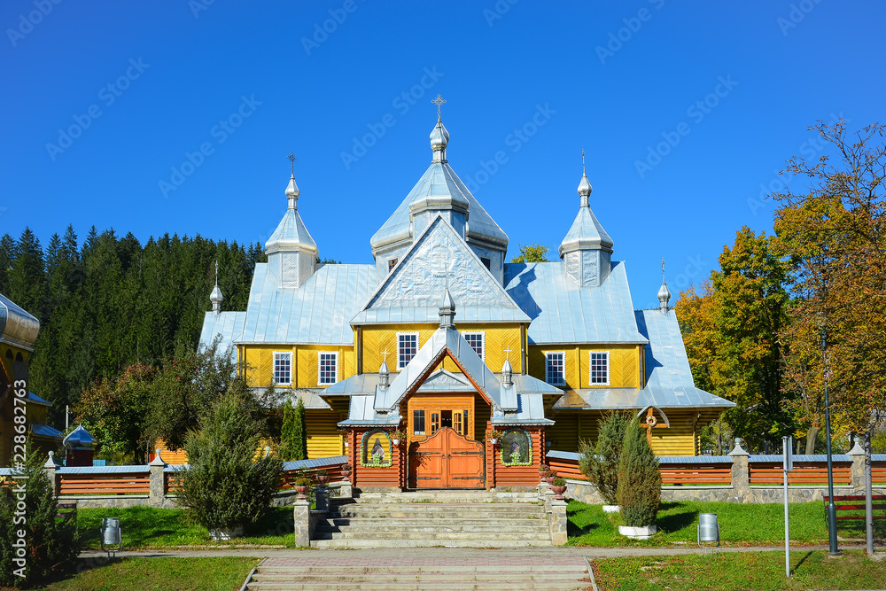 Ukrainian Greco-Catholic Church of Assumption of the Blessed Virgin in Verkhovyna, Ukraine. Wooden religious building of Christian Cathedral. Ukrainian Greco-Catholic Church of Assumption of the Blessed Virgin in Verkhovyna, Ukraine. Wooden religious building of Christian Cathedral.