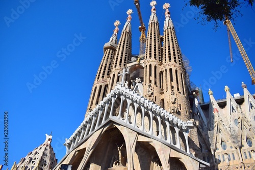Gothic temple with high towers and different facades.