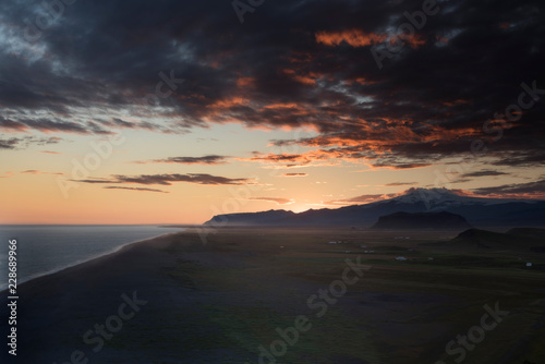 Unbelievable summer evening scene on the Vik, durholaey. Colorful sunset in Iceland, Europe. Beauty of nature concept background.