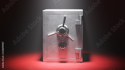 Empty steel safe on a red carpet in the spotlight.Vault doors are slowly opening