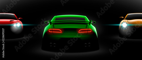 realistic red green yellow three sport car view with unlocked headlights in the dark