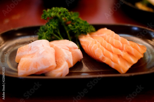 Raws fresh salmon fillet on dish in restaurant