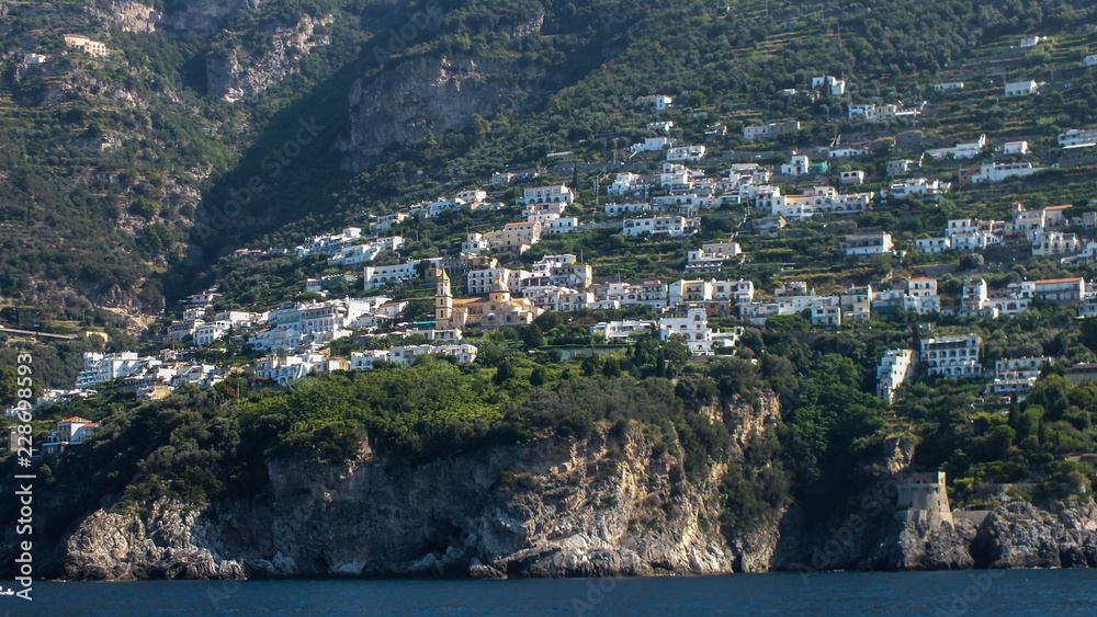Stunning jetset fairytale green town of  Praiano high on the Rocks between Amalfi and Positano, Italy