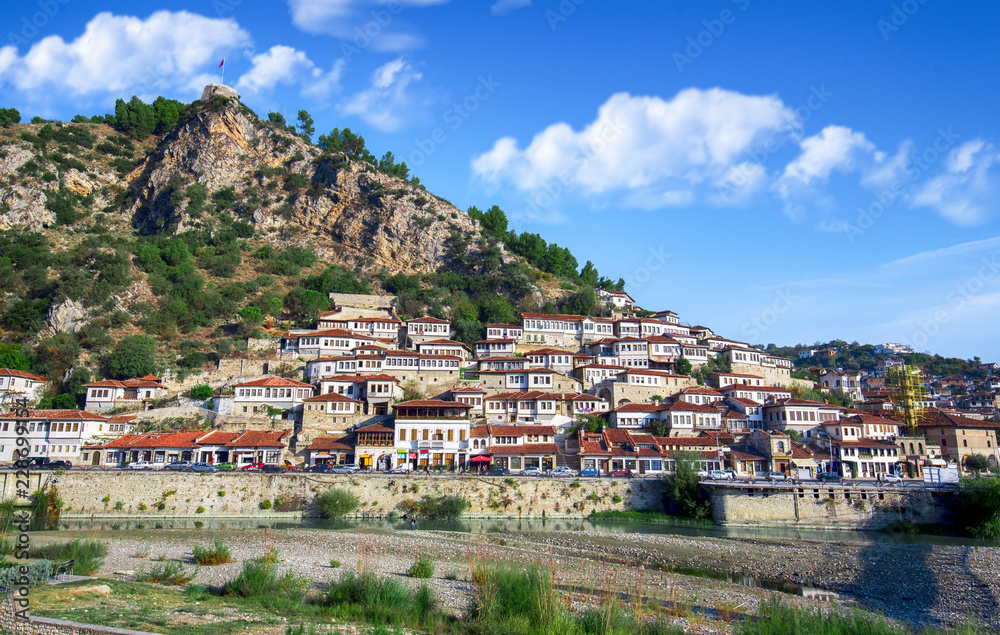 Panorama of historic city. Traditional ottoman houses in Berat old town (mangalem district) in Albania . listed as UNESCO world heritage site, along with river Osum bank. thousand windows city