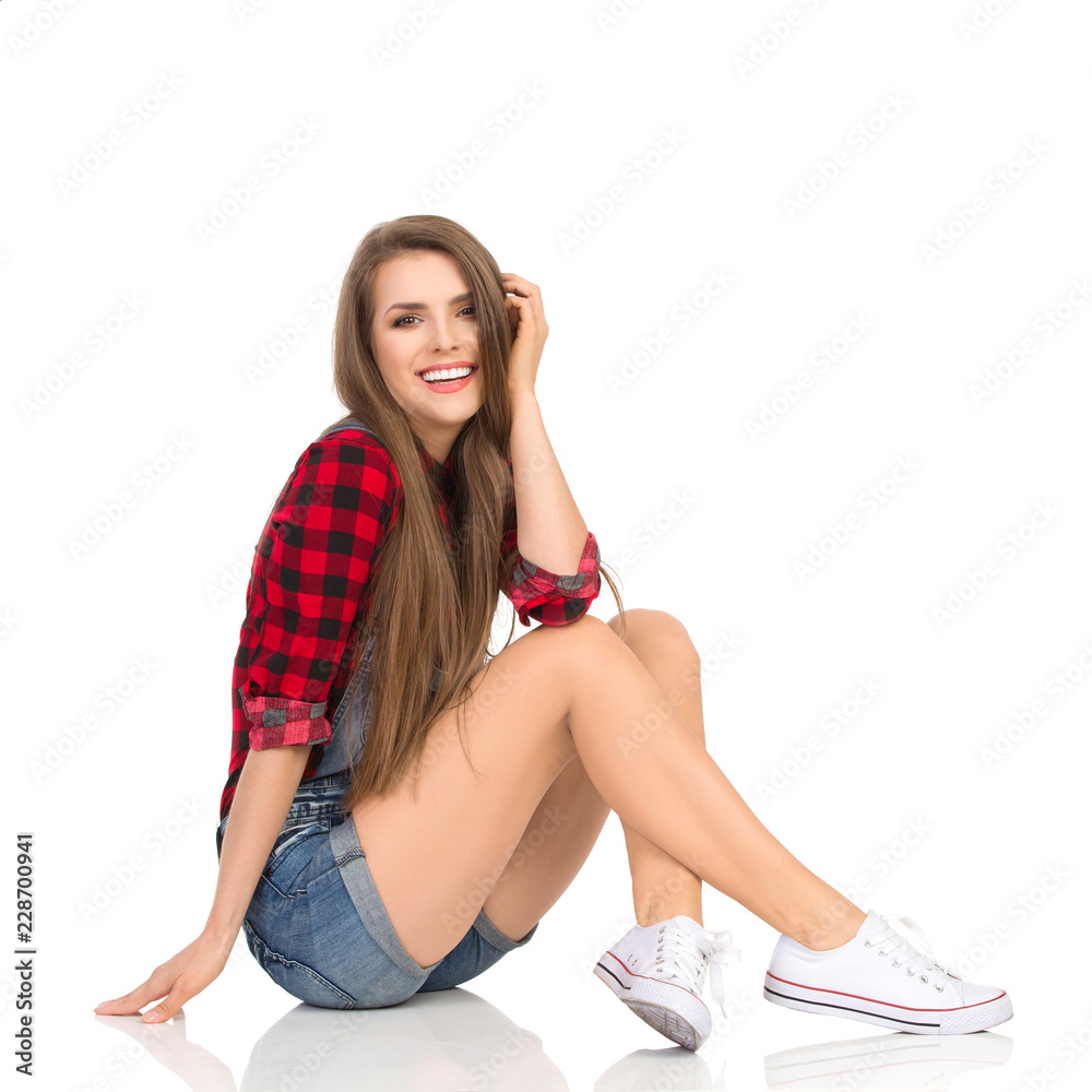 Happy Casual Woman Is Sitting On Floor Happy Casual Woman Is Sitting On Floor