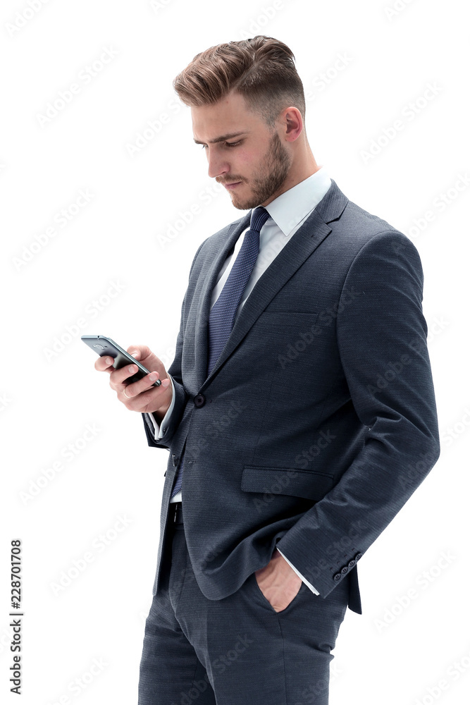 serious businessman reading text message on smartphone serious businessman reading text message on smartphone