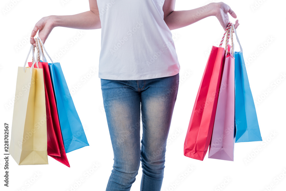 Beautiful Asian woman holding bags shopping with many colorful. Attractive woman is smiling wear a white T-shirt after purchases in the department store Isolated on a white background.