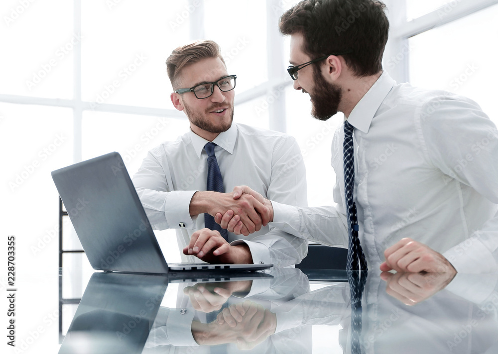 side view.business colleagues shaking hands with each other side view.business colleagues shaking hands with each other