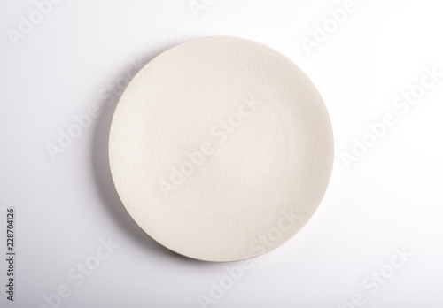 Empty dish isolated on a white background. Top view.