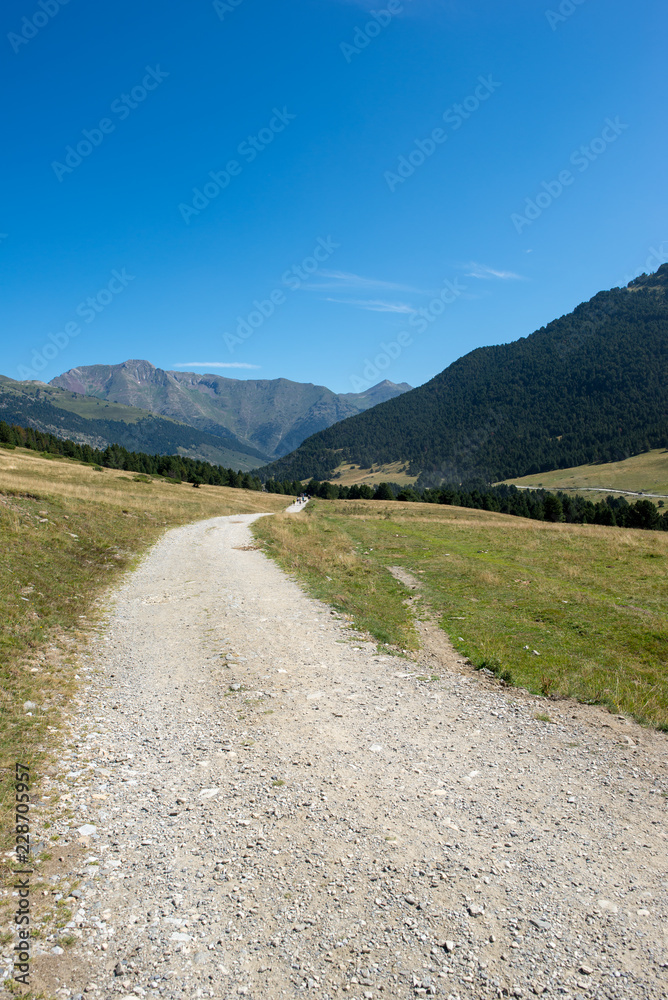 Fototapeta premium Mountains in Montgarri under blue sky, Valley of aran