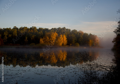 Photography Lake Malaren in stockholm an early cold and foggy autumn day, shilouettes and re