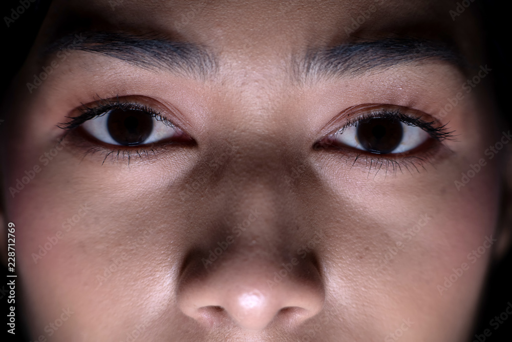 Close up on woman eye at night. Close up on woman eye at night.