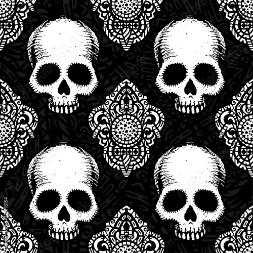 Seamless pattern with hand drawn skulls. Vector Illustration