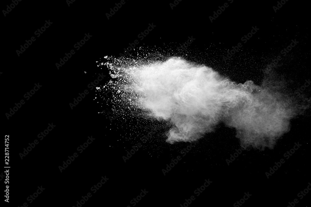 Explosion of white dust on black background. Explosion of white dust on black background.
